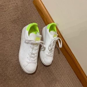 White and neon green stand smith